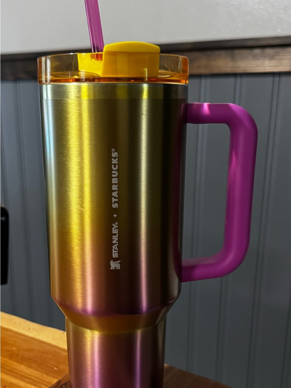 Stanley Iridescent Gold-to-Purple Travel Tumbler with Pink Handle